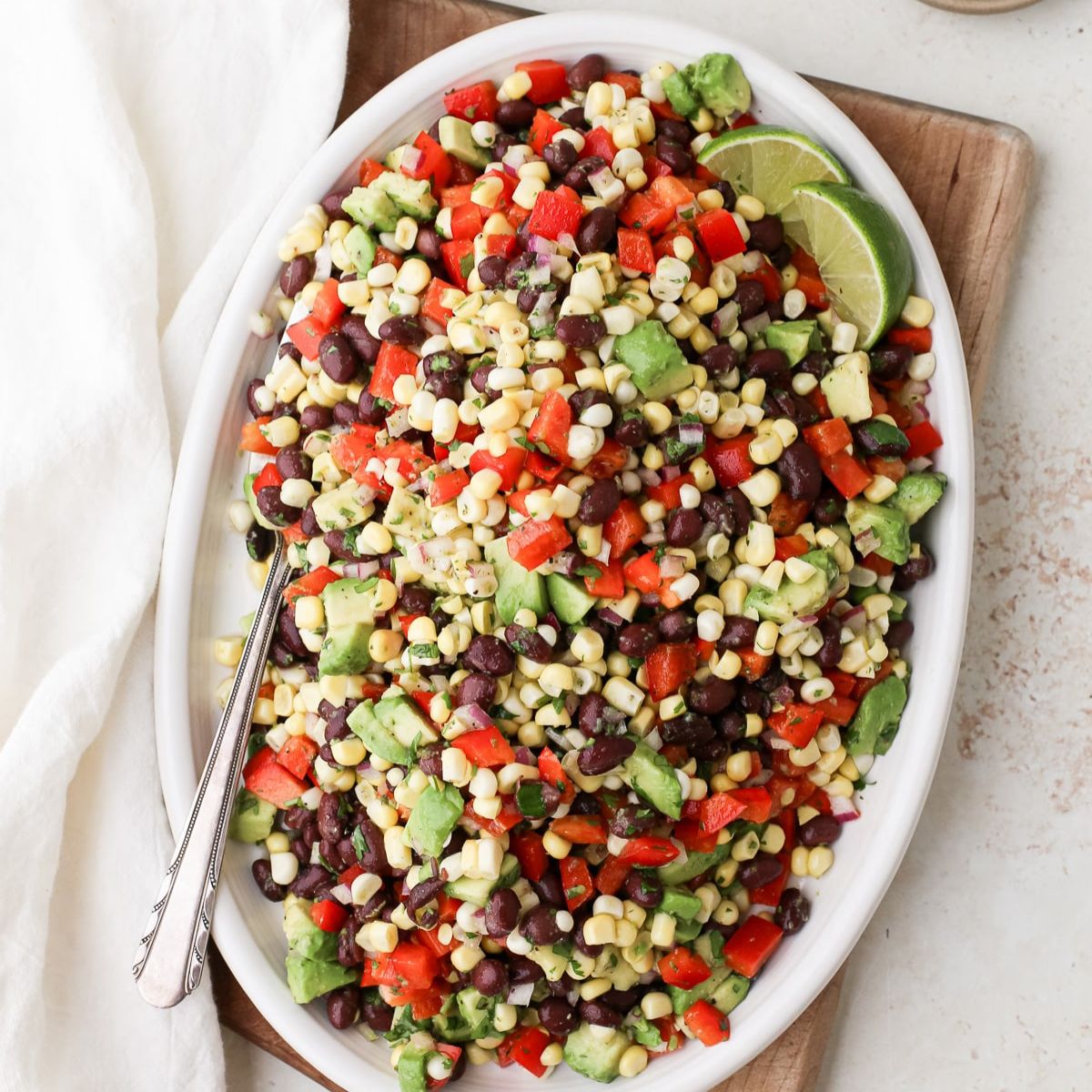 black bean corn salad in a bowl with lime