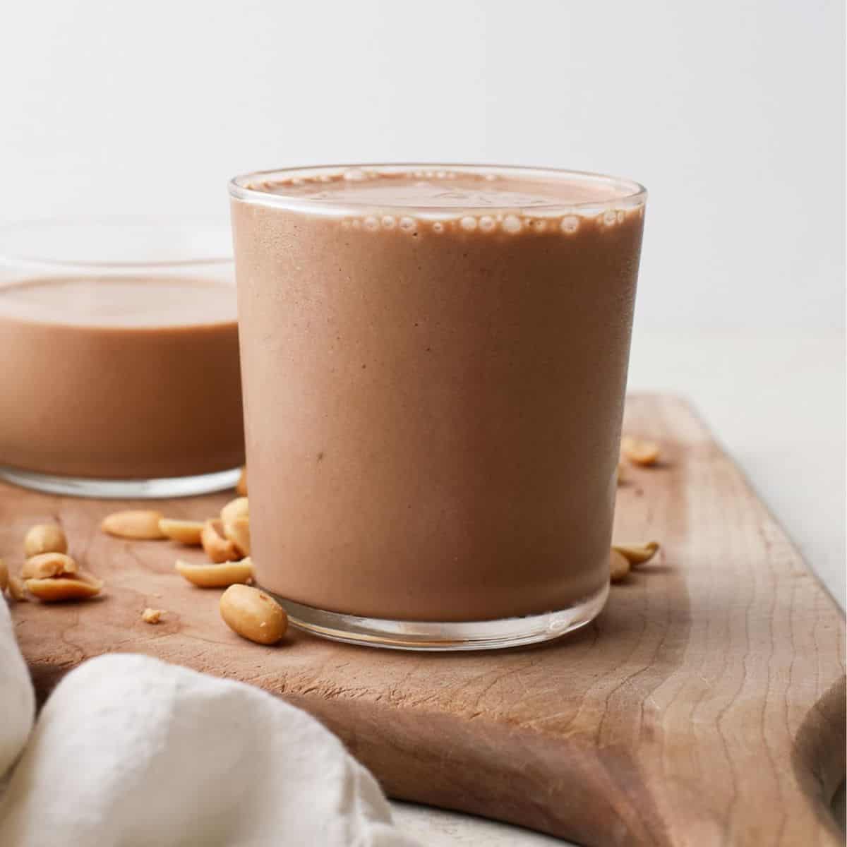 chocolate overnight oats topped with peanut butter drizzle