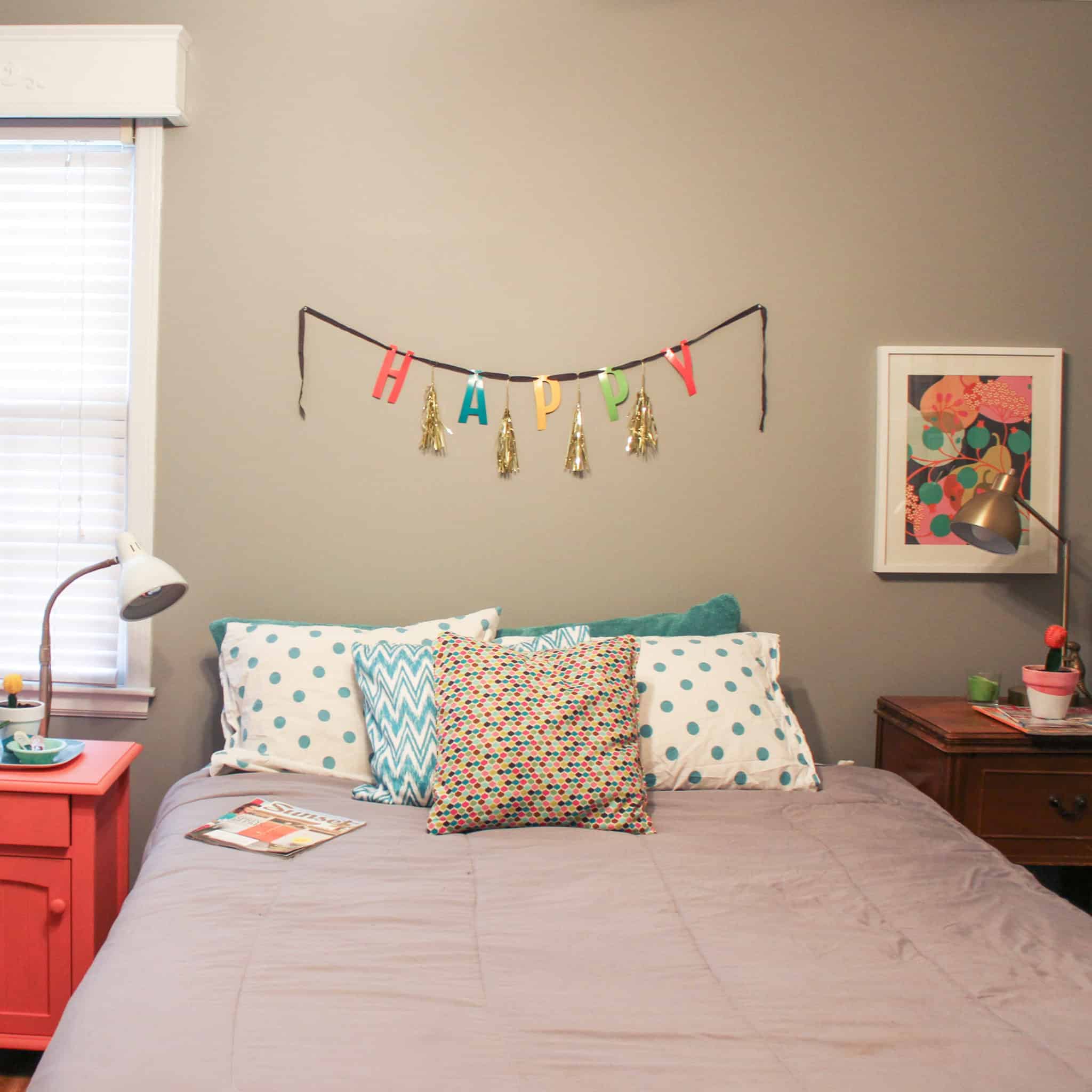 guest bedroom with a desk tucked near the window