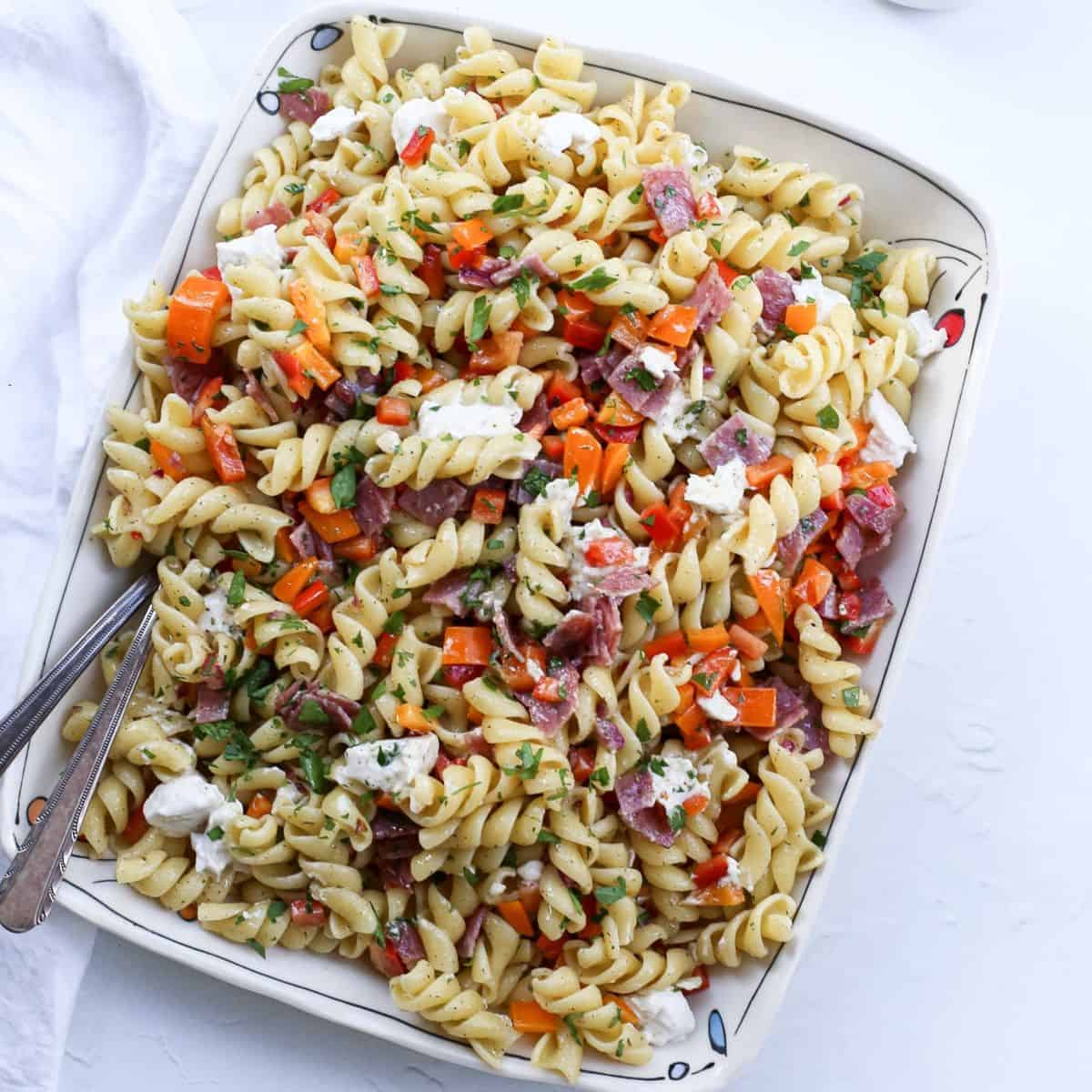 rotini pasta salad with salami, mozzarella, and peppers