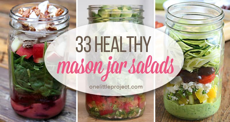 layered mason jar salad with dressing on the bottom