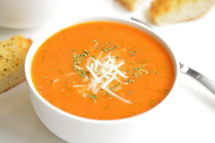 tomato basil soup with a grilled cheese on the side